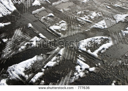 stock-photo-tire-tracks-in-the-melting-snow-on-asphalt-road-777636.jpg
